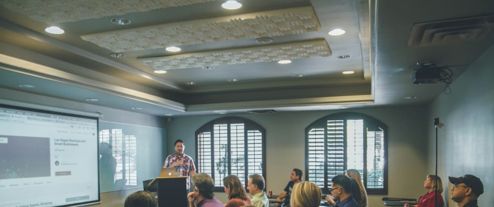 Classroom of people with a presentation